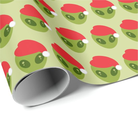 Niedliche grüne Alien in Weihnachtsmannmütze Muste Geschenkpapier (Rolleneckpunkt)