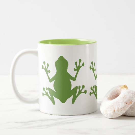 NIEDLICHE GRÜNE FROGS ILLUSTRATION MOTIF ZWEIFARBIGE TASSE (Mit Donut)