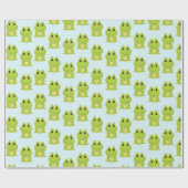 Niedliche grüne Frösche auf blau Geschenkpapier (Flach)