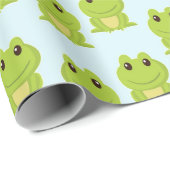 Niedliche grüne Frösche auf blau Geschenkpapier (Rolleneckpunkt)