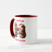 Niedliche Guinea Schweine in Liebe Austausch einer Tasse (Vorderseite Links)