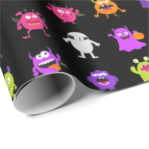 Niedliche Halloween-Monster auf schwarz Geschenkpapier