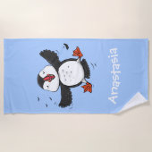 Niedliche Happy-Fying-Puffsängerin mit blauen Cart Strandtuch (Vorderseite)