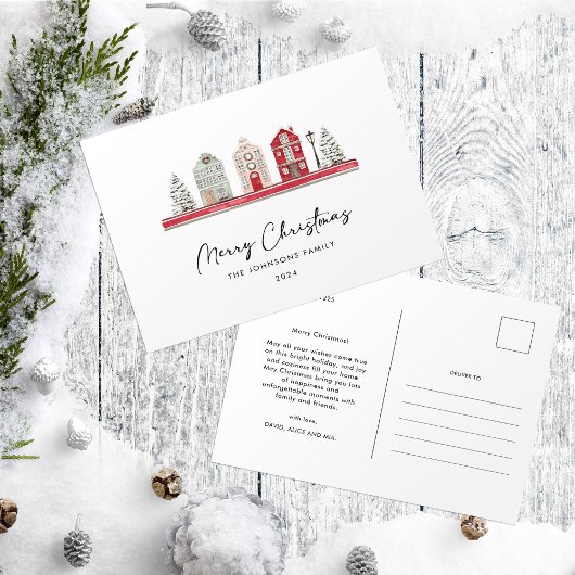 Niedliche Häuser in traditionellen Weihnachtsfarbe Postkarte