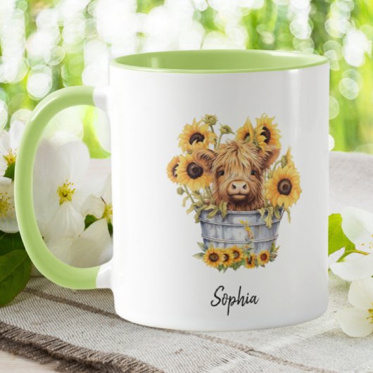 Niedliche Hochlandkuh in Eimerblüten Blüte Tasse