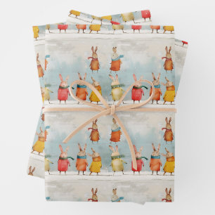Niedliche Kaninchen spielen im Schnee Geschenkpapier Set
