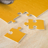 Niedliche Kätzchen-Katze mit dem iranischen Puzzle (Seite)