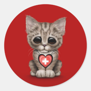 Niedliche Kätzchen-Katze mit dem Schweizer Runder Aufkleber