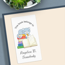 Niedliche Katze auf einem Buchstapel - Buchzeichen