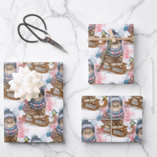 Niedliche Katze auf einem Schlitten Geschenkpapier Set