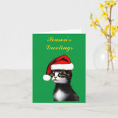 Niedliche Katze, die einen Weihnachtsmann trägt, Karte (Gelbe Blume)