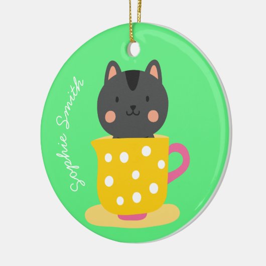 Niedliche Katze im Teacup-Cartoon auf Minze Keramik Ornament (Links)