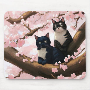 Niedliche Katzen auf einem Kirschblütenbaum Mousepad