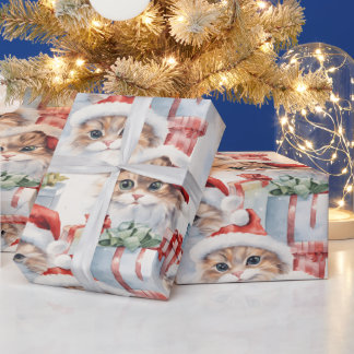 Niedliche Katzen in Weihnachtsmannmützen mit Gesch Geschenkpapier