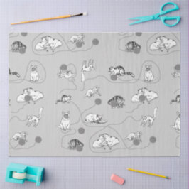 Niedliche Katzen spielen und ein schwaches Muster Seidenpapier