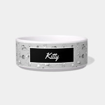 Niedliche Katzen spielen und ein schwaches Mustert