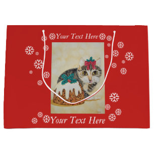 niedliche Kätzin, die zu Weihnachten Pudding isst Große Geschenktüte