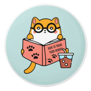 Niedliche Kawaii-Katze liest ein Buch Keramikknauf