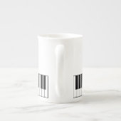 Niedliche Klaviertasten Tasse mit lächelndem Gesic (Rückseite)