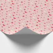 Niedliche kleine Herzen in Rosa Geschenkpapier (Ecke)