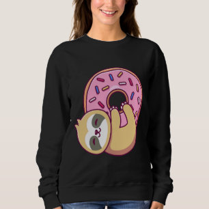 Niedliche kleine Schlampe, die einen Donut 57 umar Sweatshirt