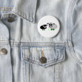 Niedliche kleine schwarze Schafe und BigGray Button (Beispiel)