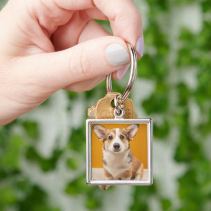 Niedliche Kleintiere Corgi Portrait auf Orange Schlüsselanhänger