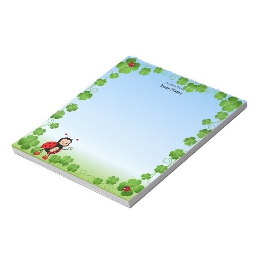 Niedliche Ladybug auf Light Blue Notizblock (Rotiert)