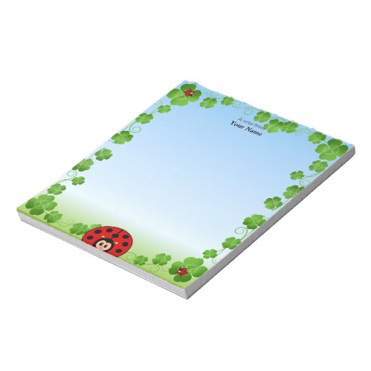 Niedliche Ladybug auf Light Blue Notizblock (Rotiert)