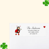 Niedliche Ladybug und Herz auf Weiß