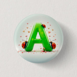Niedliche Ladybugs auf dem Alphabet-Brief A Button