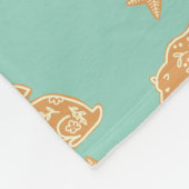 Niedliche Lebkuchenkochen auf Minze Fleecedecke (Ecke)