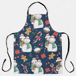 NIEDLICHE MÄDCHEN MIT WINTERSCHNEE UND KANDYKANEN SCHÜRZE