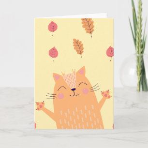Niedliche orangefarbene Katze spielt in Herbstlaub Karte