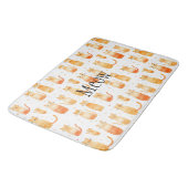 Niedliche orangefarbene Punkte und Katzen Badematte (Schrägansicht)