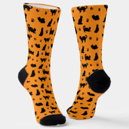 Niedliche orangefarbene und schwarze Katzen und Pa Socken