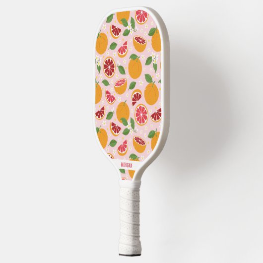 Niedliche Orangen auf hellrosa Pickleball Schläger (Links)