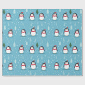 Niedliche Pinguine auf Light Blue mit Schneeflocke Geschenkpapier (Flach)
