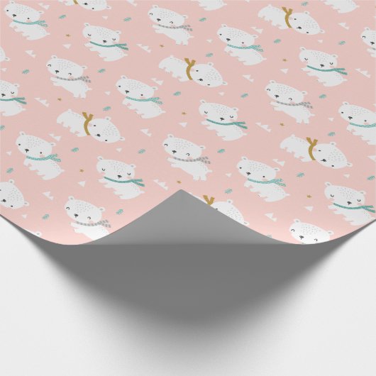 Niedliche Polarbären mit Schals auf hellrosa Geschenkpapier (Ecke)