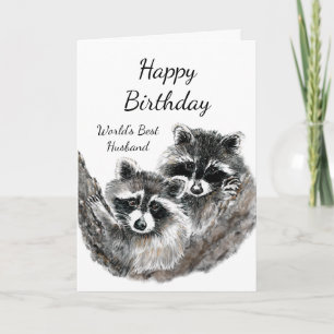 Niedliche Raccoon-Tiere zum Geburtstag der weltbes Karte