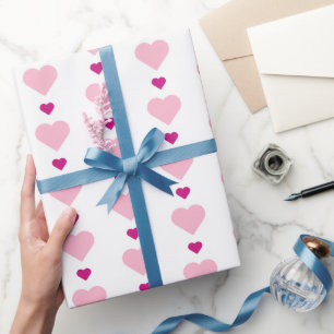 Niedliche rosa Herzen auf weißer Symmetrie Geschenkpapier