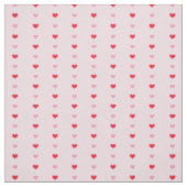 Niedliche rosa und rote Herzen auf hellrosa Farbe Stoff (Muster)