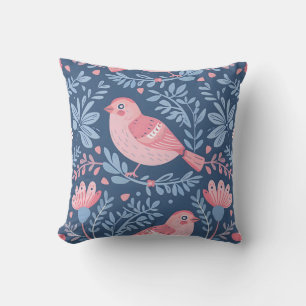 Niedliche rosa Vögel auf blau-grau Kissen