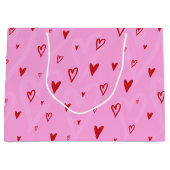 Niedliche rote Herzen auf rosa Hintergrund Große Geschenktüte (Vorderseite)