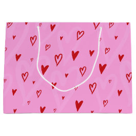 Niedliche rote Herzen auf rosa Hintergrund Große Geschenktüte