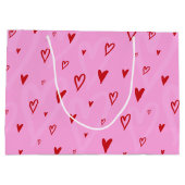 Niedliche rote Herzen auf rosa Hintergrund Große Geschenktüte (Rückseite)