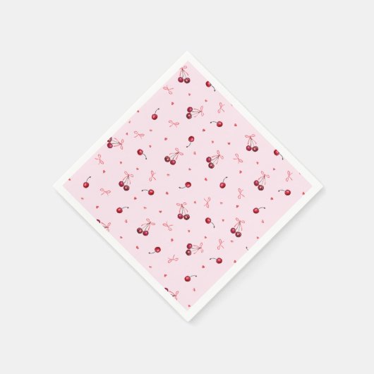 Niedliche rote Kirschen hören Bows auf rosa Serviette (Ecke)