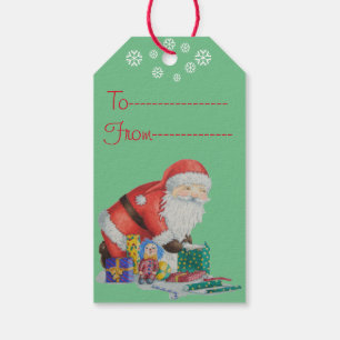 Niedliche Sankt und Spielwaren, die Geschenkanhänger