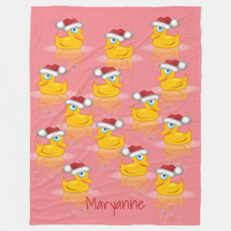 Niedliche Santa Rubber Enten im Hintergrund in hei Fleecedecke