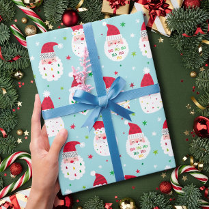Niedliche Santas mit festlichen Bärenblauen Geschenkpapier